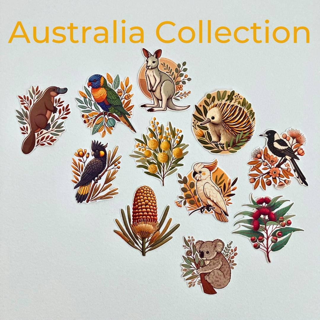 A collection of Australian-themed stickers showing a platypus, rainbow lorikeet, kangaroo, echidna, black cockatoo, wattle, white cockatoo, magpie, eucalyptus blossom, banksia, and koala. &quot;Australia Collection&quot; is written in yellow above the stickers